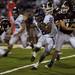 Pioneer senior wide receiver Vada McGowan evades a Dexter defender Friday. Pioneer defeated Dexter 69-0.  Daniel Brenner I AnnArbor.com
